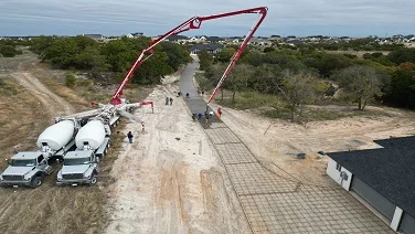 Concrete pouring at construction site
