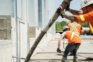 Concrete contractors working on a project.